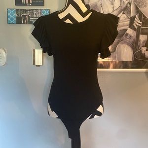 Black bodysuit with ruffle sleeves